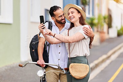 Buy stock photo Outdoor, couple and selfie with bicycle on holiday, vacation adventure and tourists with photography. Happy people, man and woman with hug, document experience and bonding on honeymoon trip in France