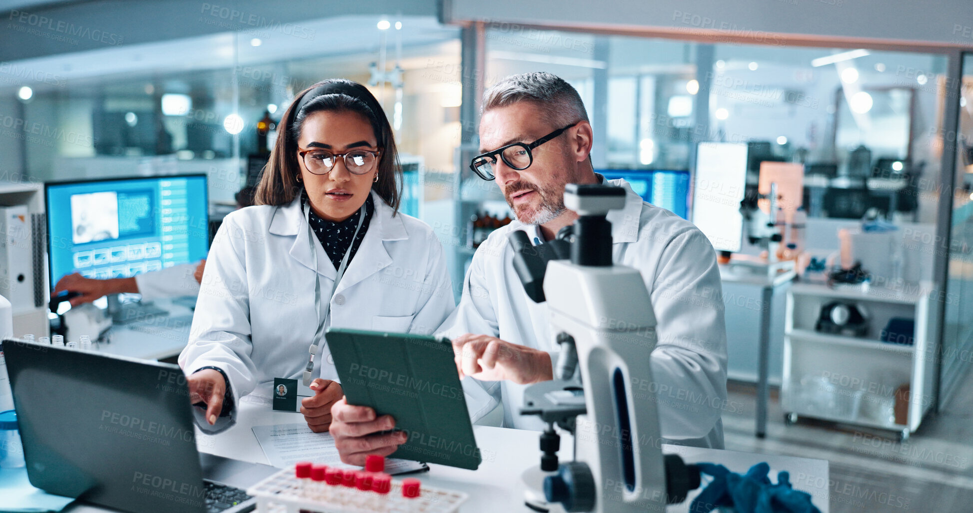 Buy stock photo Collaboration, tablet or science with people in lab together for research or development. Innovation, tech and microscope with scientist team in clinical trial for planning or medical investigation