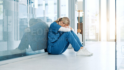 Buy stock photo Healthcare, nurse and stress on floor in hospital hallway with bad news, treatment fail and regret. Health expert, woman and overwhelmed with anxiety for medical doubt, clinic crisis and patient loss