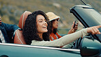 Pointing, road trip or friends in car for holiday, travel or vacation on outdoor adventure. Happy, explore or women with destination, view or motor vehicle for weekend getaway, scenery or journey
