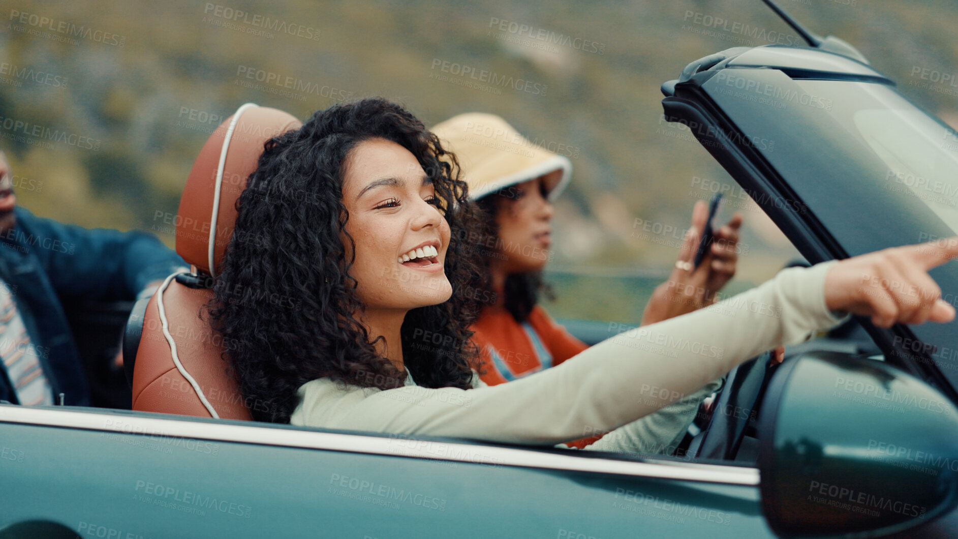 Buy stock photo Pointing, road trip or friends in car for holiday, travel or vacation on outdoor adventure. Happy, explore or women with destination, view or motor vehicle for weekend getaway, scenery or journey