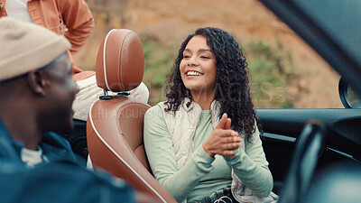 Buy stock photo Talking, road trip or friends in car for travel, vacation or holiday on outdoor adventure. Chat, explore or women with destination, smile or motor vehicle for getaway, journey or break in convertible