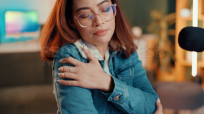 Buy stock photo Woman, shoulder pain and mic for live stream, stress or eyes closed for injury at apartment. Gen z girl, influencer and frustrated for muscle fatigue, strain or burnout with podcast recording in home