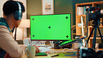 Green screen, computer and man with live streaming in home for editing project on videography. Technology, content creation and back of male influencer with recording for online podcast in apartment.