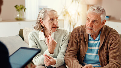Buy stock photo Tablet, home and senior couple with nurse in discussion for medical service, support and help. Retirement, healthcare and person with mature man and woman on tech for consulting in assisted living