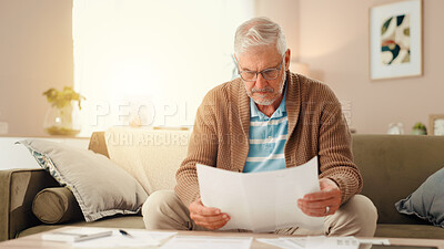 Buy stock photo Senior man, reading or finance with documents for retirement or pension fund at home. Elderly, male person or budget planning with paperwork for mortgage expenses, financial bills or invoice at house