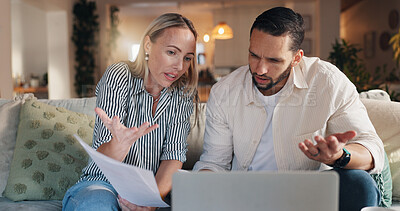 Buy stock photo Sofa, couple and laptop with disagreement for document, financial bills and confused with budget. Home, woman and man with paperwork for tax deduction, mortgage expenses and conflict in living room