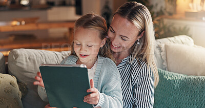 Buy stock photo Home, mother and girl on sofa, tablet and bonding together with online entertainment. Happy family, apartment and mama on couch, education app and daughter with tech, internet and help with smile