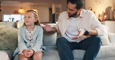 Buy stock photo Girl, talk and ignore dad on sofa for teaching, question or worry in lounge with guide at house. People, father and child in living room for discipline, advice or learning from mistake at family home
