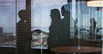 Business people, shaking hands and silhouette at office, success and congratulations for promotion. Team, group and handshake with gratitude, deal and reflection by window at human resources agency
