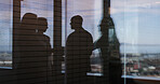 Discussion, window reflection and business people in office with partnership for finance report. Meeting, collaboration and financial advisors with investors for company budget planning in workplace.