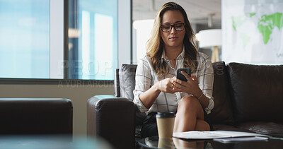 Buy stock photo Phone, reading and waiting with business woman in office lobby for job opportunity or vacancy. App, resume and text message with candidate on sofa in workplace for hiring, interview or recruitment