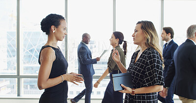 Buy stock photo Lobby, office and business women in discussion with notebook for feedback, advice and planning. Professional, corporate and workers in meeting for strategy, project and proposal for cooperation
