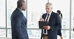 Document, discussion and business men in office for finance contract with investment negotiation. Paperwork, conversation and financial advisor with manager for feedback on budget report in workplace