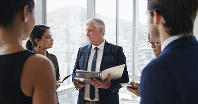 Buy stock photo Manager, documents and business people in meeting in office for feedback, financial review and planning. Corporate, delegating and boss with workers with report for strategy, budget and proposal
