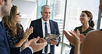 Business man, documents and group with applause at meeting, winning and success at office. People, CEO and team with congratulations with smile, achievement and cheers for profit with goal at agency