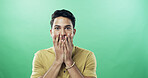 Surprise, excited and portrait of man in studio with good news, announcement or amazing deal. Mockup space, shock and person with reaction for wow, happiness or omg expression by green background.