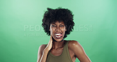 Buy stock photo Portrait, funny face and black woman in studio, smile and confident personality on green background. African person, pride and happy model with goofy emoji, crazy and tongue out with humor and silly