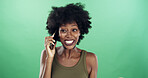 Phone call, excited and black woman in studio for communication, contact or social networking. Happy, cellphone and African female person with connectivity by green background with mockup space.