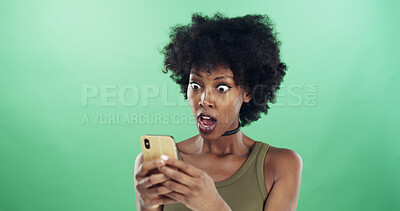 Buy stock photo Phone, shock and text message with black woman in studio for communication of bad news or update. App, serious and social media with reaction of angry person on green background for notification