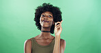 Black woman, thinking or solution with afro on green background for problem solving in studio. Female person, thinker and African model with good decision for idea, question or answer on mockup space