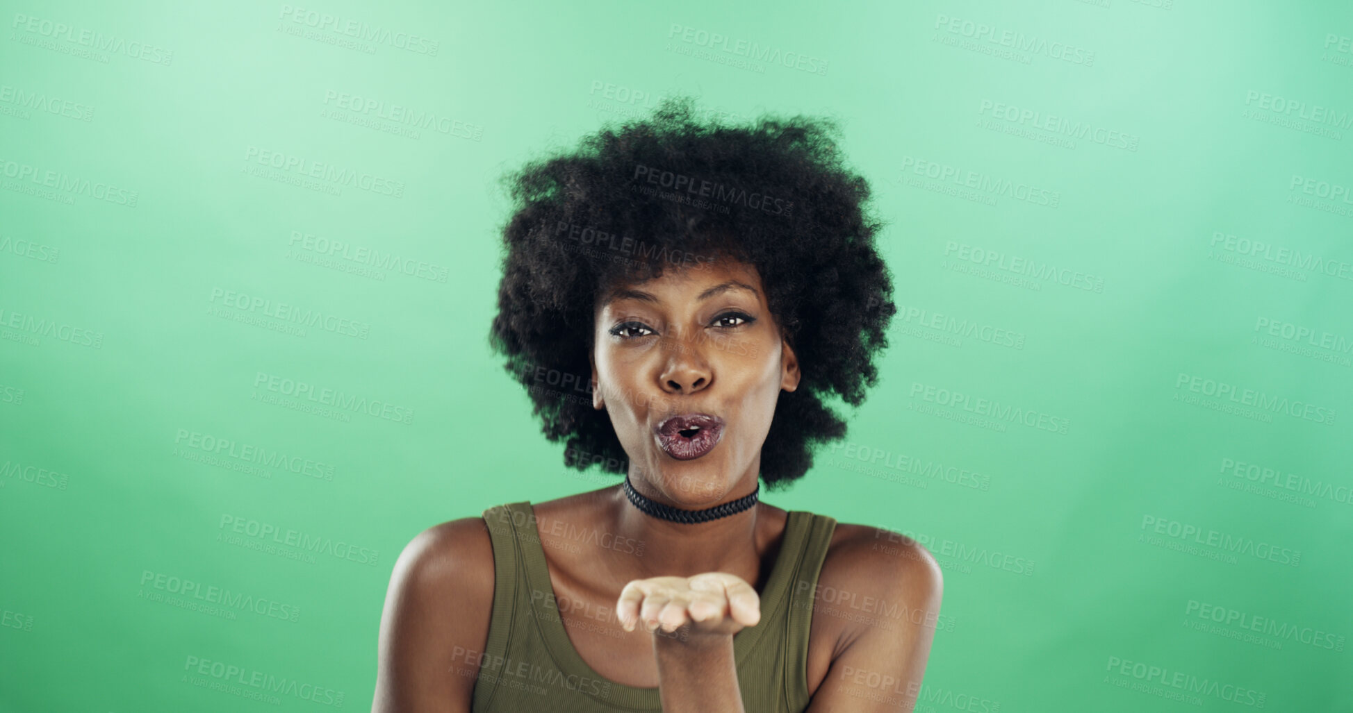 Buy stock photo Portrait, blow kiss or black woman on green background for mockup space, confidence or happiness. Studio, female model or face of African person with afro for flirting fun, love gesture or romance