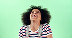 Black woman, laughing and funny joke with comic in studio, humor or hilarious with happy reaction. Crazy, silly or African female person in comedy with space for positive emotion on green background
