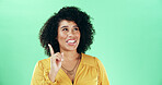 Ideas, pointing and woman in studio with choice, decision or planning for education career. Happy, mockup space and female teacher with thinking for lesson with problem solving by green background.