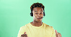 Happy, headset and african man talking in studio for call center, telemarketing and green background. Lead generation, telesales and person for sales, inbound marketing and networking by space