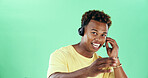 Black man, headset and happy in studio for call center, advice and mockup space with talk by green background. Person, agent and sales consultant with voip mic, portrait and telemarketing in Nigeria