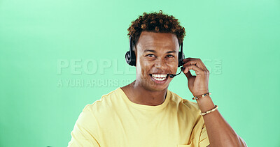 Buy stock photo Black man, headset and smile in studio for call center, advice and space with talk by green background. Male person, agent and sales consultant with voip mic, portrait and telemarketing in Kenya
