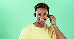 Portrait, headset and african man laugh in studio for call center, customer care and green background. Contact us, technical support and operator for help desk, advice and inquiry by mockup space