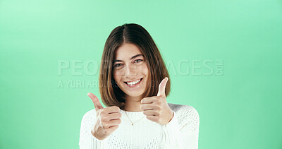 Buy stock photo Portrait, smile and thumbs up with woman on green background for celebration, success or yes. Emoji, like and reaction with happy person in studio for motivation or support as winner of competition