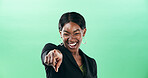 Black woman, pointing at you and portrait for business recruitment, hiring or choice to join us on green background. HR manager, corporate selection or professional invite for vacancy space in studio
