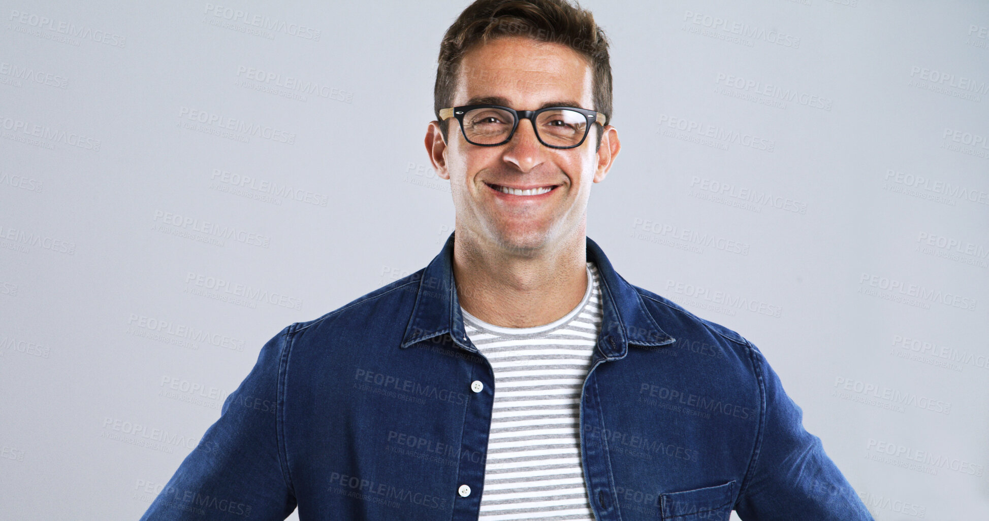 Buy stock photo Happy man, portrait and glasses for fashion or eye care, trendy eyewear and vision in studio. Designer frame, spectacles and smile with denim style, space and prescription lens on white background