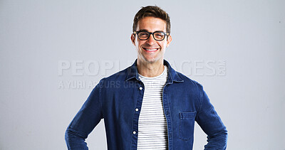 Buy stock photo Man, smile and glasses for fashion or eye care, trendy eyewear and vision in studio. Designer frame, spectacles and portrait with denim style, space and prescription lens on isolated white background