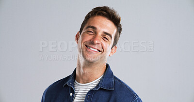 Buy stock photo Portrait, happy and man for fashion in studio with casual clothes, trendy style and positive attitude. Mockup, smile and male person with cool outfit, denim jacket and good mood on gray background 