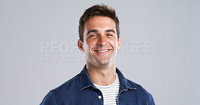 Buy stock photo Portrait, man and proud for fashion in studio with casual clothes, trendy style and positive attitude. Mockup, happy and male person with cool outfit, denim jacket and good mood on gray background 