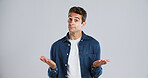 Man, hands and space in studio for choice, portrait and option with mock up by background. Person, model and open palm for decision, review and question for retail customer experience in Portugal