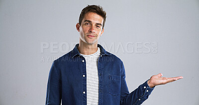 Buy stock photo Portrait, man and palm with presentation in studio for advertising, offer deal or announcement. Mockup, ambassador or show marketing space for about us, coming soon or opportunity on white background