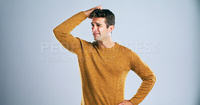 Buy stock photo Confused, scratching head and thinking with man in studio for doubt, problem solving or question. Emoji, solution and why with unsure person on white background for answer, decision or mistake