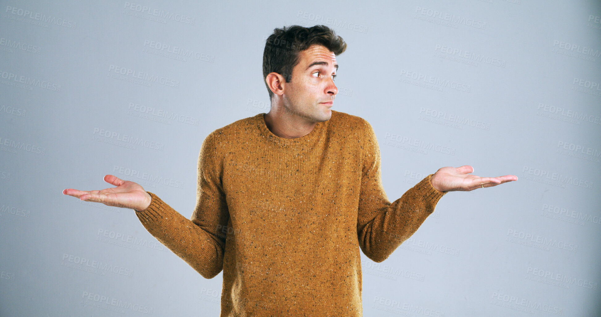 Buy stock photo Confused, shrugging and thinking with man in studio for doubt, problem solving or question. Search, solution and uncertain with unsure person on white background for answer, decision or mistake