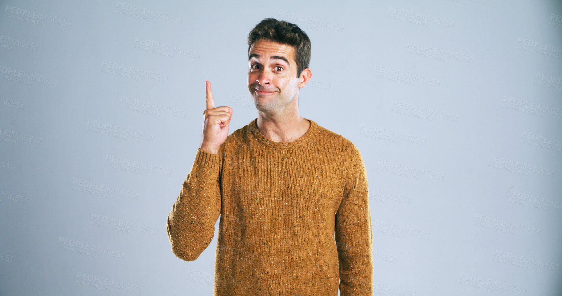 Buy stock photo Man, space and pointing up portrait with mockup, playful advertising and info on white background. Goofy, promotion and silly person with deal announcement in studio with choice, opinion or news