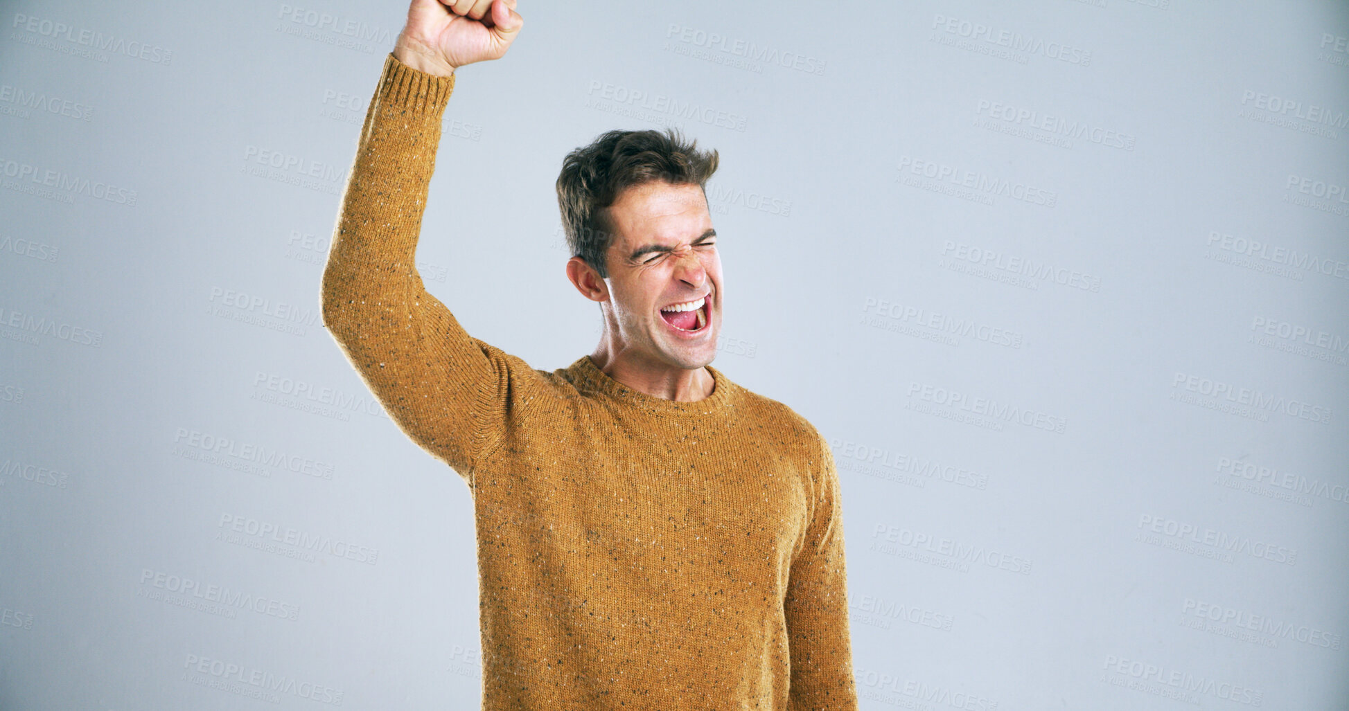Buy stock photo Man, winner and fist pump in studio with shout, success and finance goals by background. Person, celebration and excited with eyes closed, scream and mock up space for investment, revenue and profit