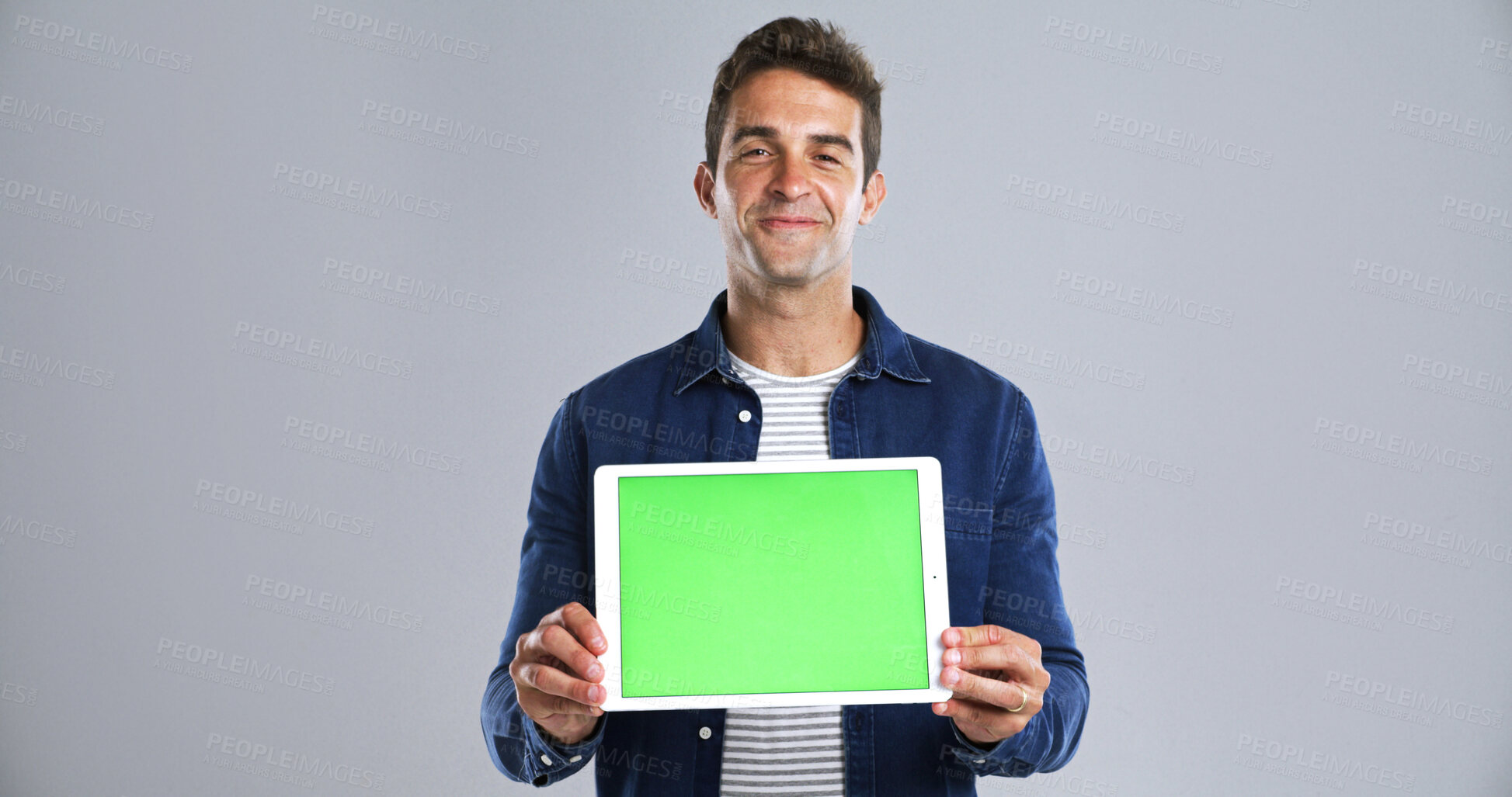 Buy stock photo Tablet, man for green screen and mockup in portrait in studio, UI advertising or website ads for blog. Display space, technology or marketing for streaming subscription with promo on white background