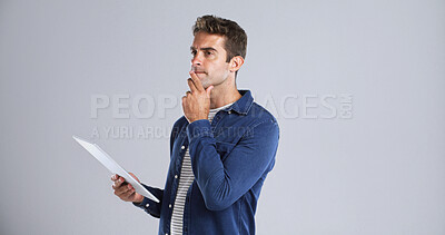 Buy stock photo Thinking, tablet and businessman in studio planning for creative project with email for client approval. Ideas, decision and graphic designer with digital tech for editing by white background space