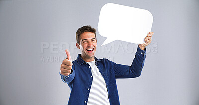 Buy stock photo Thumbs up, happy man and speech bubble in studio for agreement, communication or feedback. Social media, dialogue balloon or like hand for funny joke or portrait on white background with mockup space