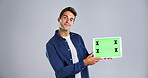 Man, portrait or tablet with green screen for marketing new app, UI or UX on a white background. Male person, model or user with technology display or tracking markers for advertising on mockup space