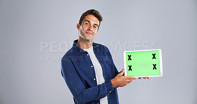 Buy stock photo Man, portrait or tablet with green screen for marketing new UI app or UX on white background. Male person, studio or user with technology display or tracking markers for advertising on mockup space