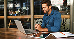 Man, reading and laptop at cafe at night for research, proofreading article and information. Journalist, online and review email with story feedback, newsletter update and publishing for working late